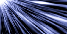 Radiant light spreading from the corner, blue, black background