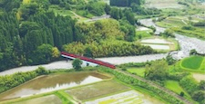 Scenery with a railway in Kokonoe-machi during the rainy season